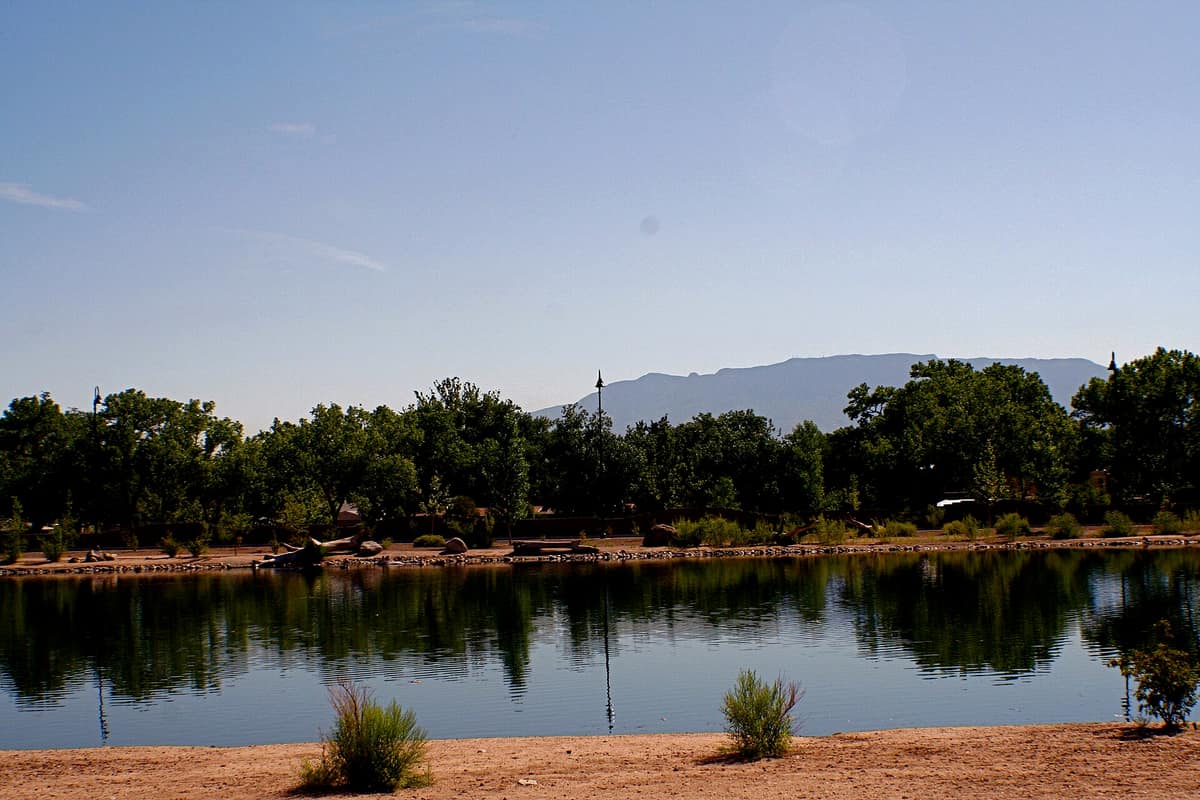 The Sandia Mountains seen across a Tingley Beach pond